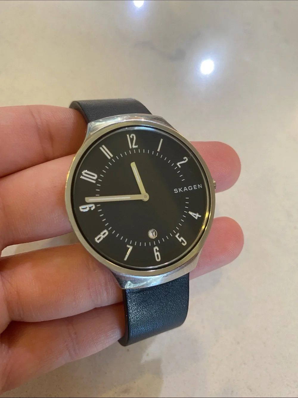 Skagen stainless steel silver watch with a black leather watch band 18